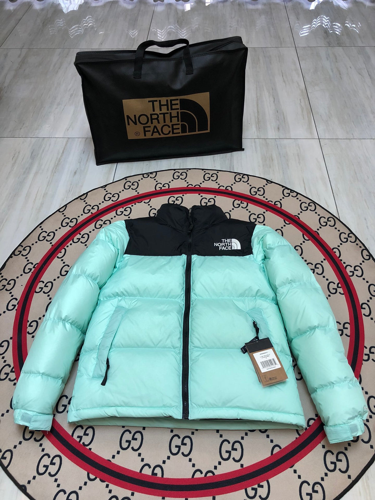 The North Face Mint Green and Black Colorblock Puffer Jacket