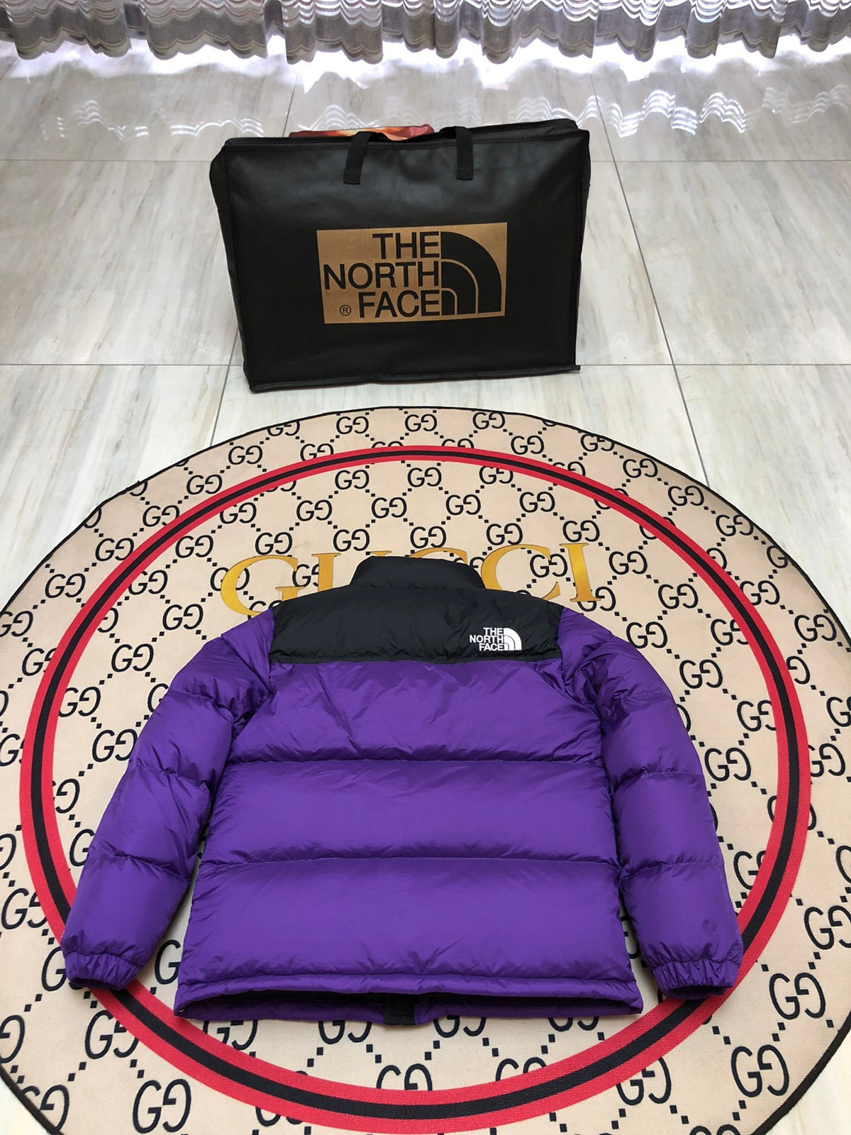 The North Face Purple and Black Colorblock Puffer Jacket