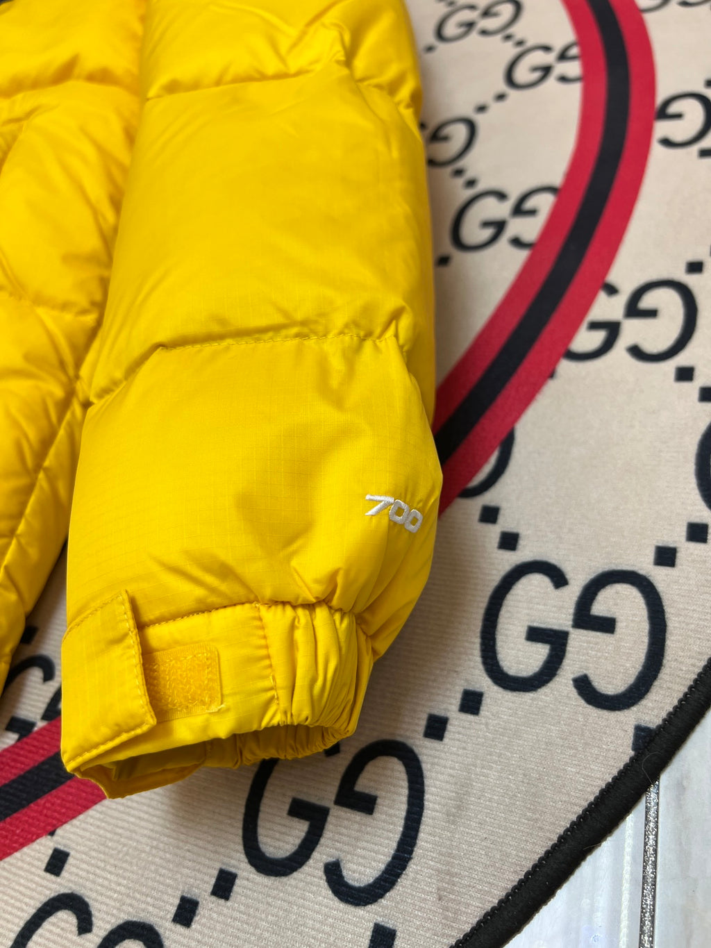 The North Face Yellow and Black Colorblock Puffer Jacket